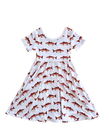 Flat layer of short sleeve twirl dress with white background and red fish with pockets