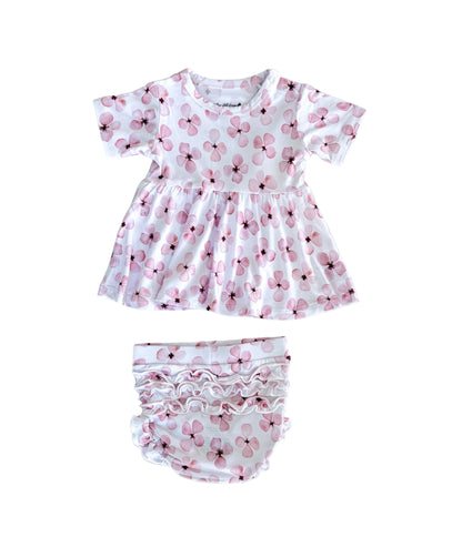 Baby peplum and bloomers set with pink floral pattern on a white background