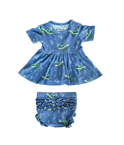 Children's blue peplum and ruffle bloomers set with sea turtle pattern on a white background