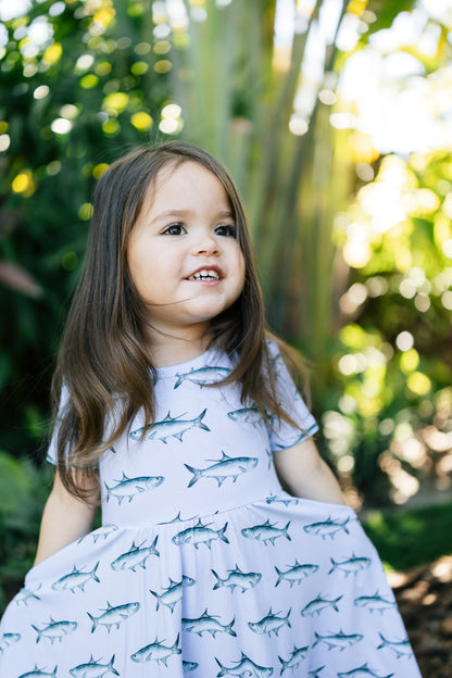 Close up of young girl in a tarpon dress