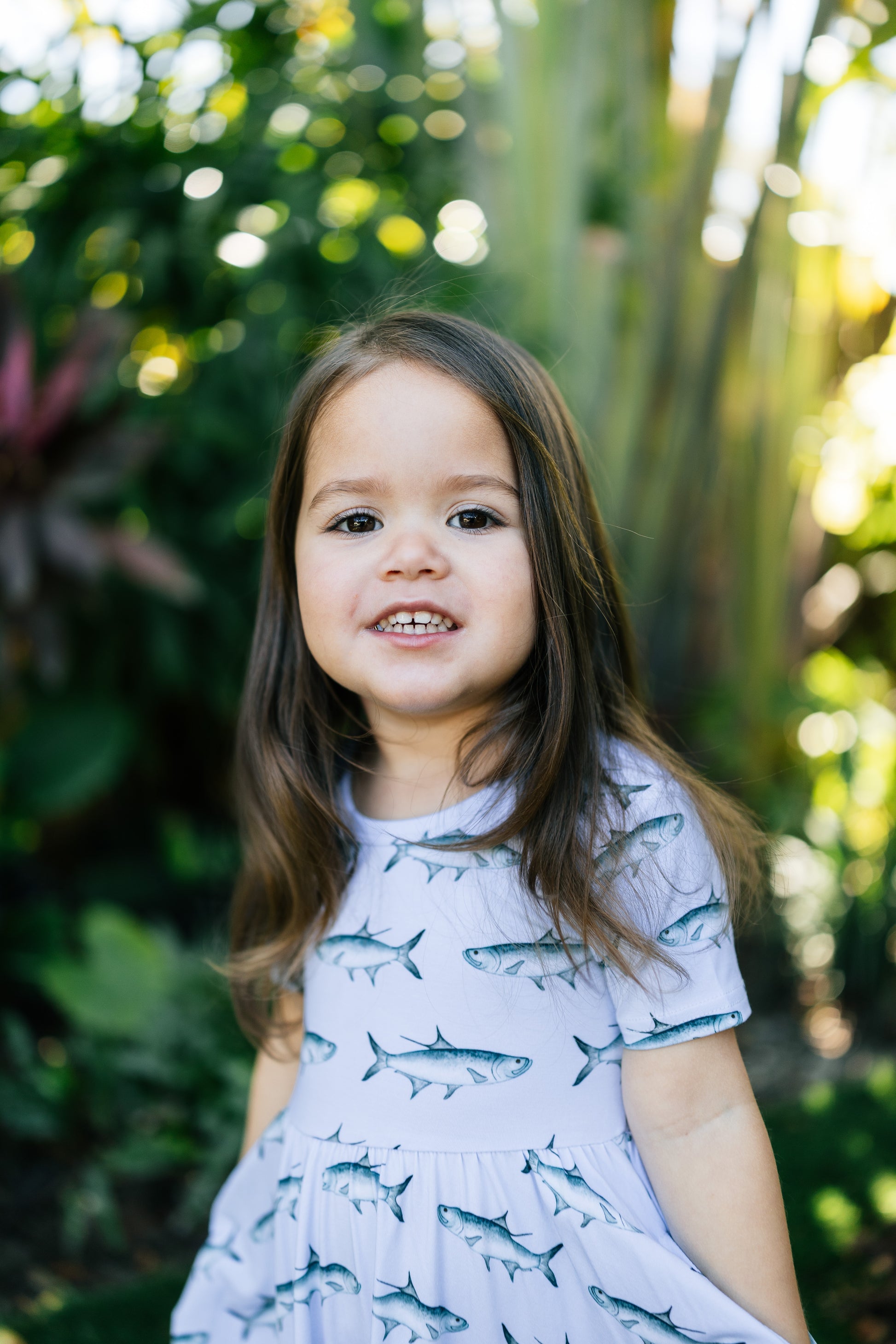 Close up of young girl modeling tarpon dress