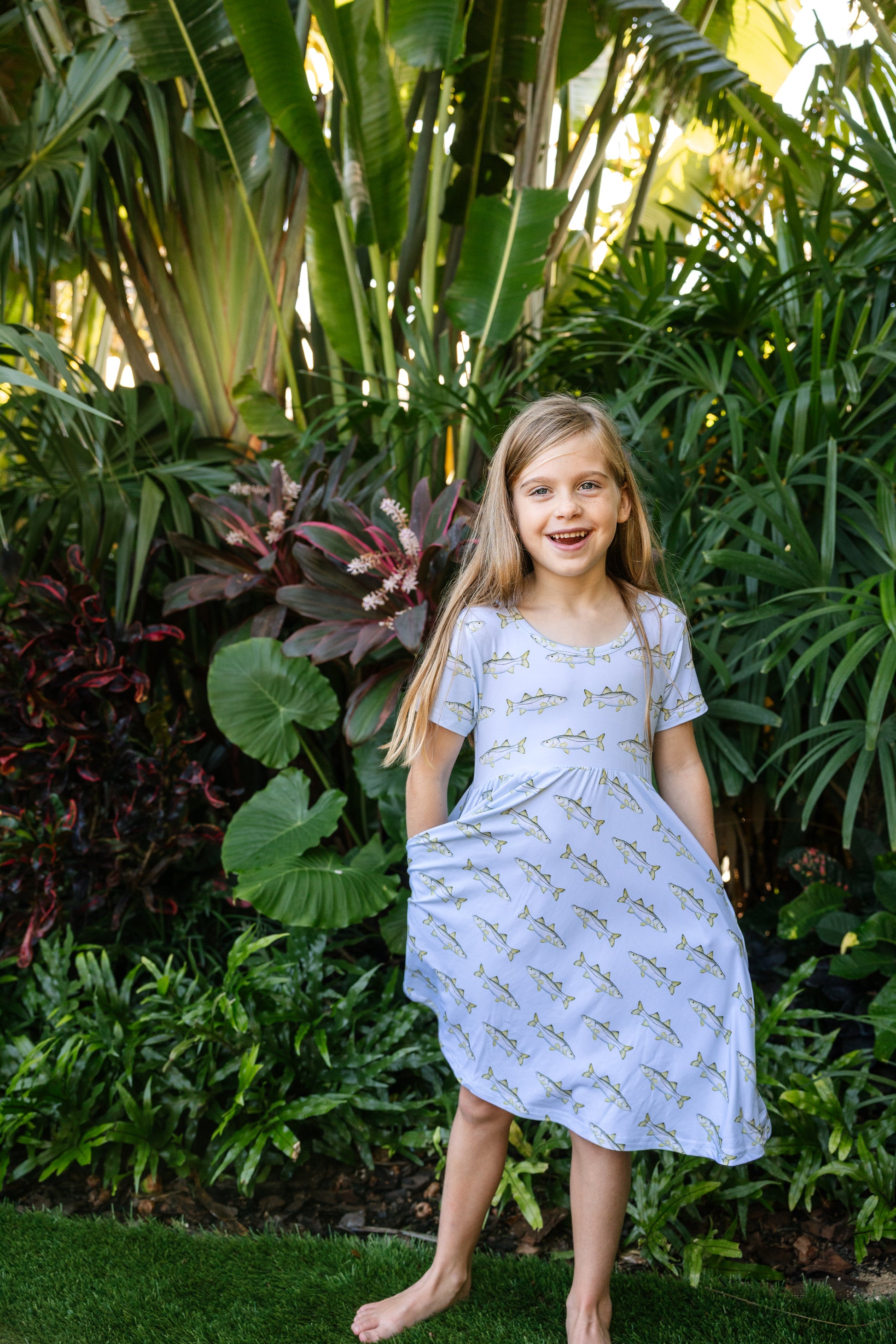 young girl in snook seaside dress smiling
