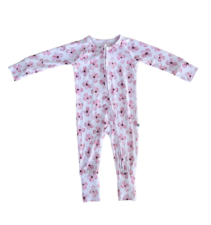 pink Floral-patterned Zippy pajama onesie on white background