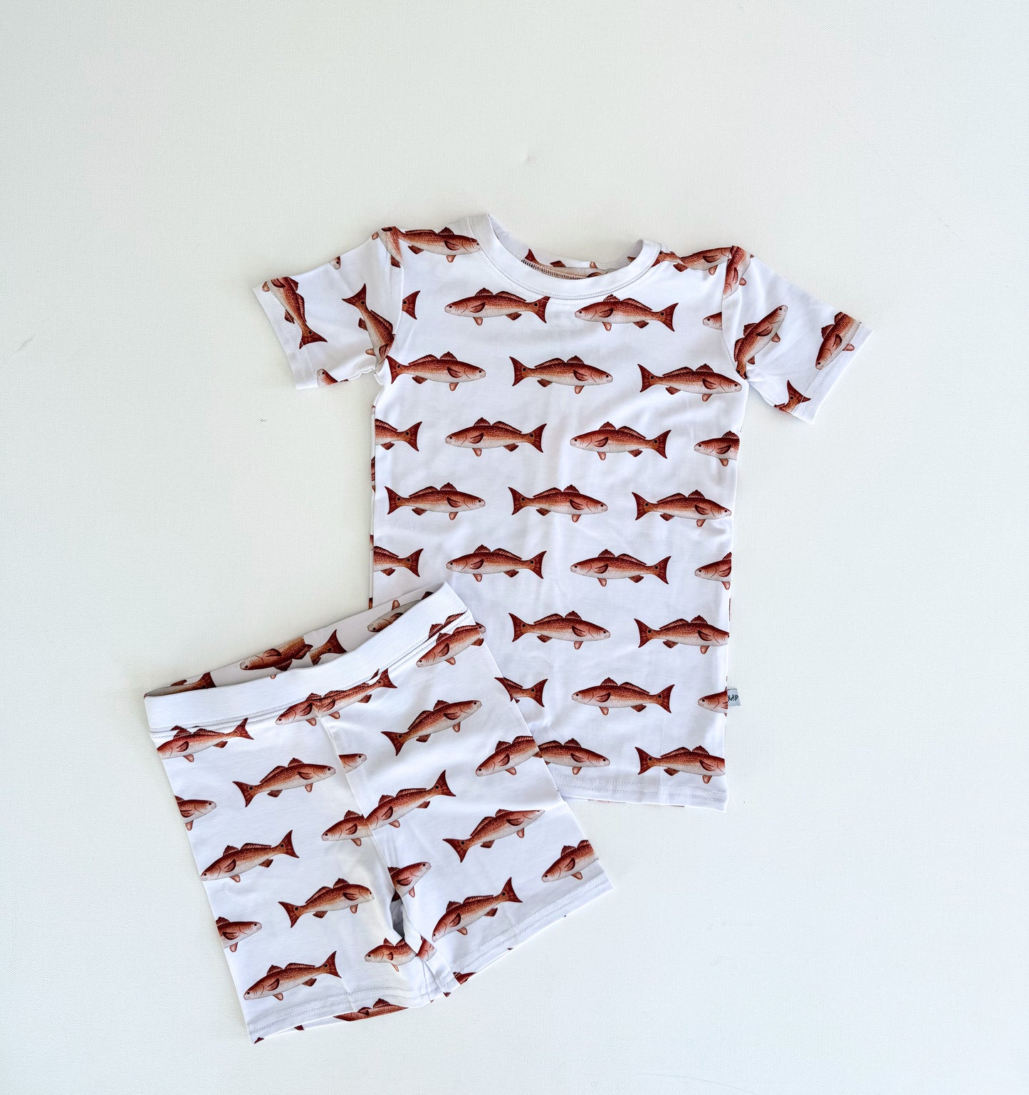 White short sleeve pajamas with a red fish