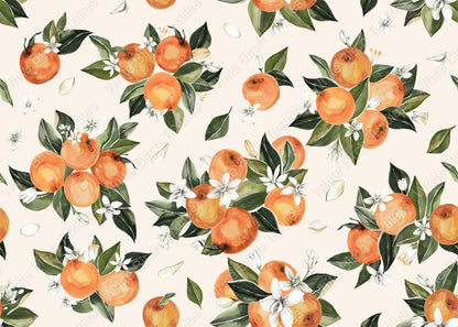 Pattern of oranges and leaves on a beige background